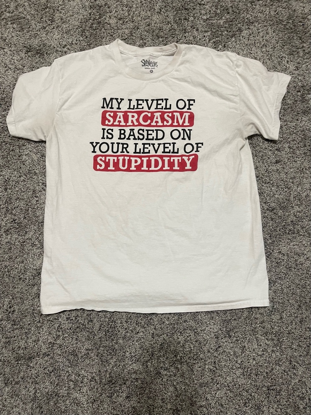 Spencer's White T-Shirt with Red and Black Text